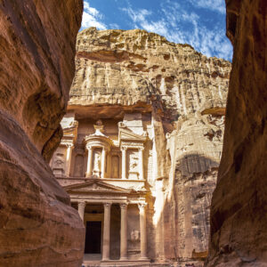 incredible and breathtaking view of the Al-Khazneh treasury through the walls of the canyon al-Siq