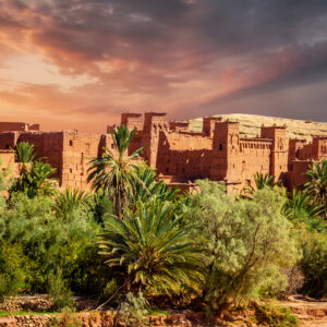 Kasbah Ait Ben Haddou in the desert near Atlas Mountains at sunset, Morocco